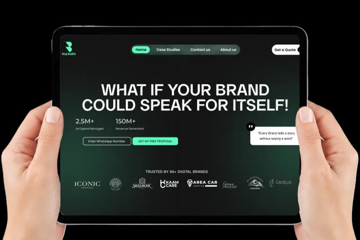BuzzLabs tablet marketing site held in hands