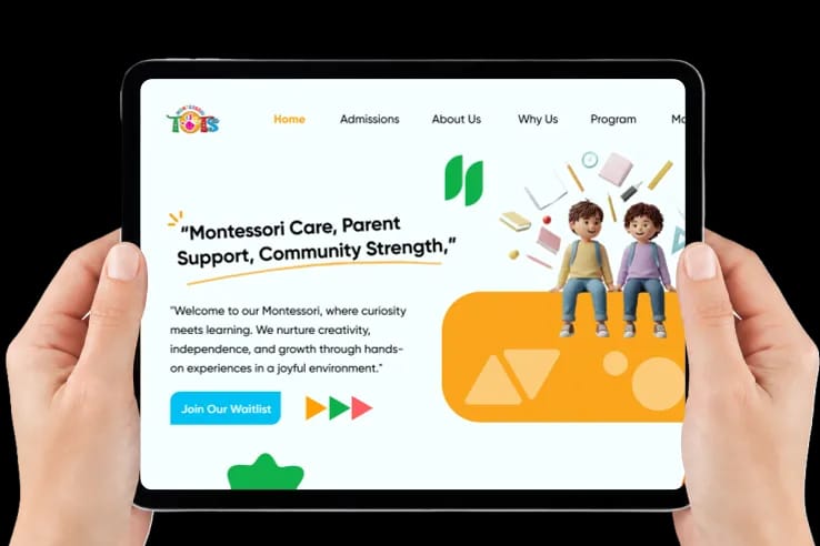 TOTS Montessori tablet website held in hands